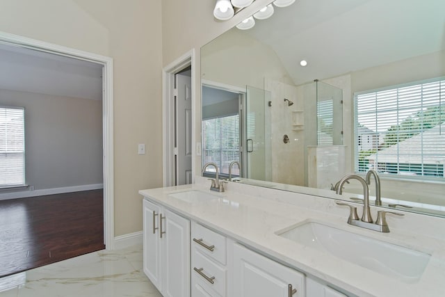 2505 Hunters Run Dr, Plano, TX 75025 - bathroom featuring a shower stall, vaulted ceiling, healthy amount of natural light, and marble finish flooring