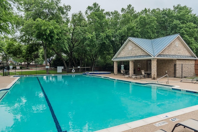 2505 Hunters Run Dr, Plano, TX 75025 - community pool with a patio area