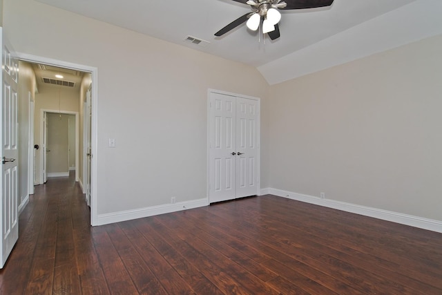 2505 Hunters Run Dr, Plano, TX 75025 - unfurnished bedroom with wood-type flooring, a closet, vaulted ceiling, attic access, and a ceiling fan