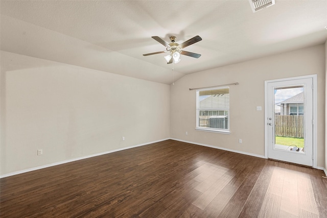 3217 Beutel Rd, Lorena, TX 76655 - empty room featuring dark wood-type flooring, a ceiling fan, and vaulted ceiling