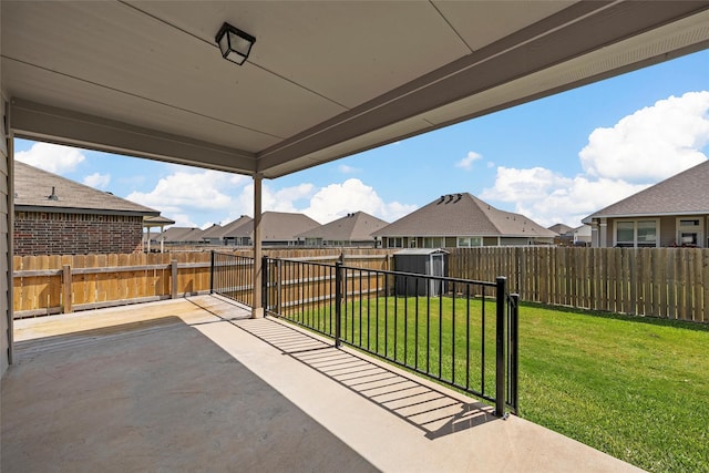3217 Beutel Rd, Lorena, TX 76655 - fenced backyard featuring a patio, a storage shed, and a residential view