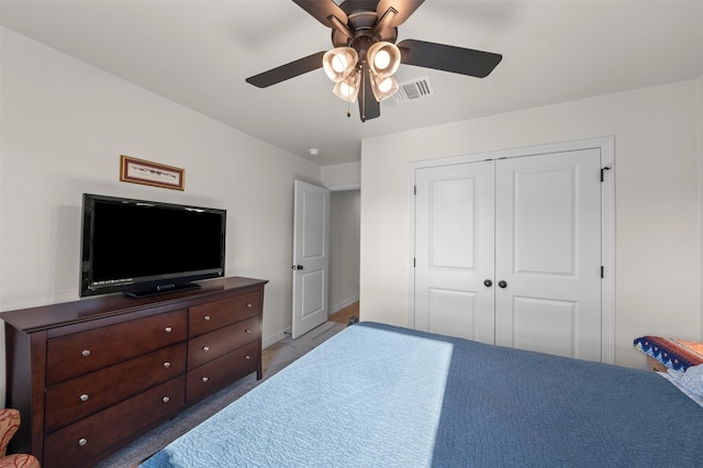 6105 Parma Ln, Temple, TX 76502 - carpeted bedroom with a closet and ceiling fan