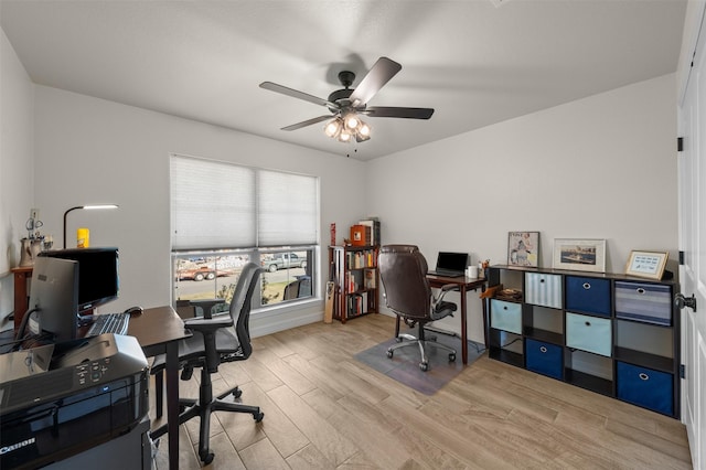 6105 Parma Ln, Temple, TX 76502 - home office with a ceiling fan and light wood-type flooring