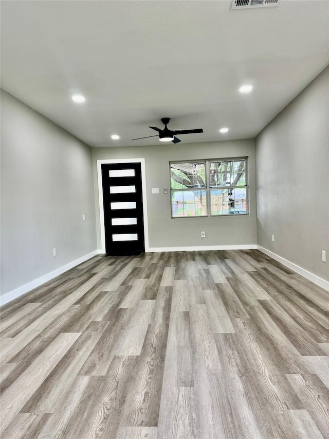 3633 Flamingo Way, Mesquite, TX 75150 - unfurnished living room with ceiling fan, wood finished floors, and recessed lighting