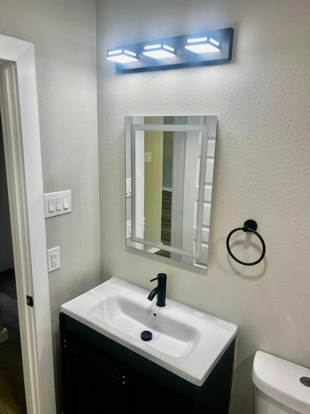 3633 Flamingo Way, Mesquite, TX 75150 - bathroom with vanity and a textured wall