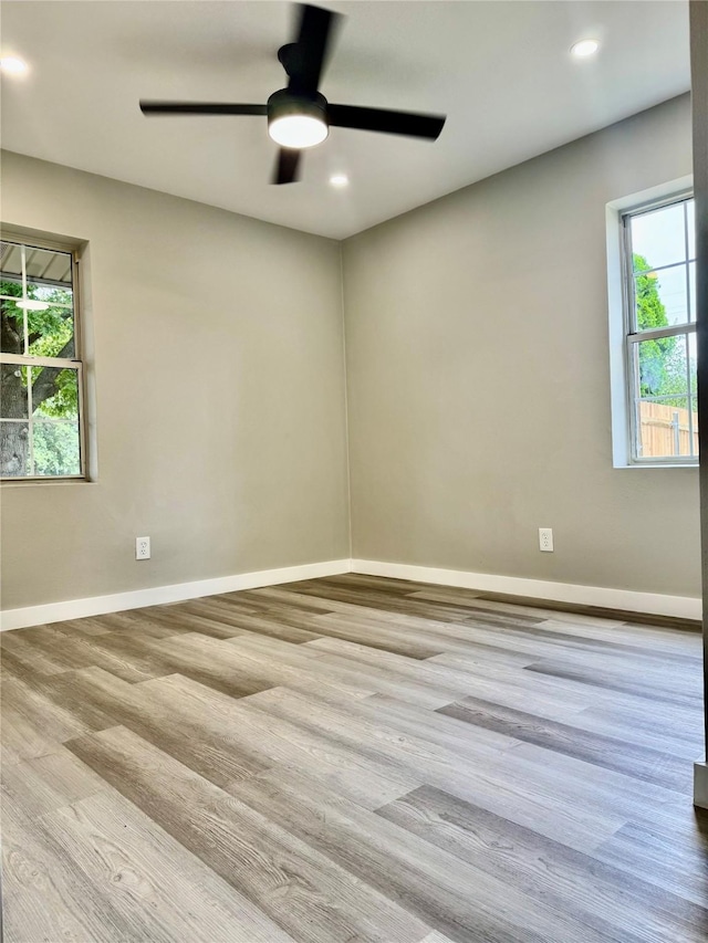 3633 Flamingo Way, Mesquite, TX 75150 - empty room featuring wood finished floors, recessed lighting, and a ceiling fan