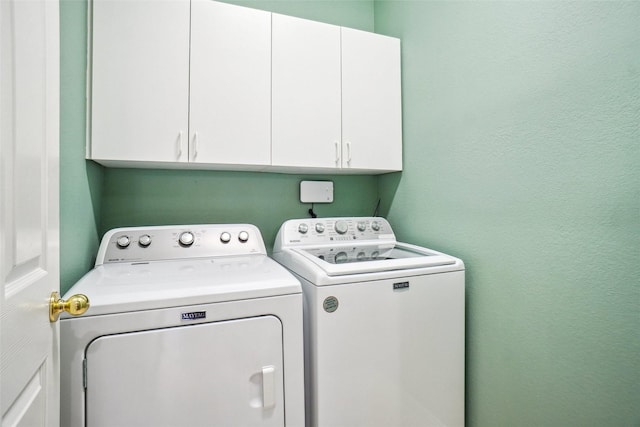 448 Shade Tree Cir, Hurst, TX 76054 - washroom featuring cabinet space and washing machine and dryer