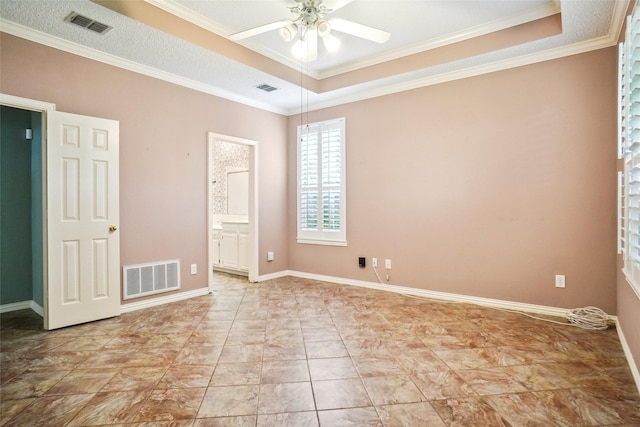 448 Shade Tree Cir, Hurst, TX 76054 - spare room with a raised ceiling, a ceiling fan, and ornamental molding