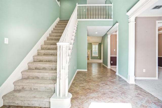 448 Shade Tree Cir, Hurst, TX 76054 - stairway featuring ornate columns and baseboards