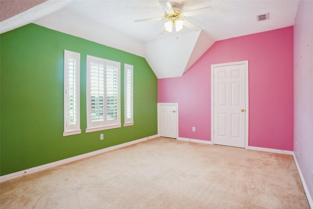 448 Shade Tree Cir, Hurst, TX 76054 - bonus room featuring vaulted ceiling, a ceiling fan, a textured ceiling, and carpet floors