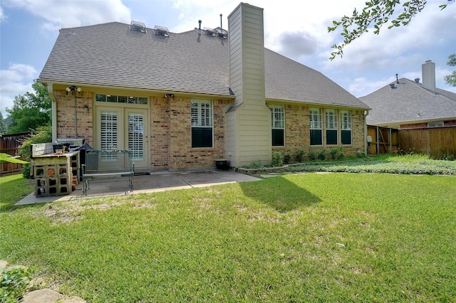 448 Shade Tree Cir, Hurst, TX 76054 - back of house featuring brick siding, french doors, and a patio