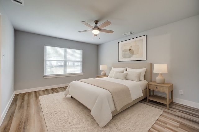 606 E 12th St, Bonham, TX 75418 - bedroom featuring light wood finished floors and ceiling fan
