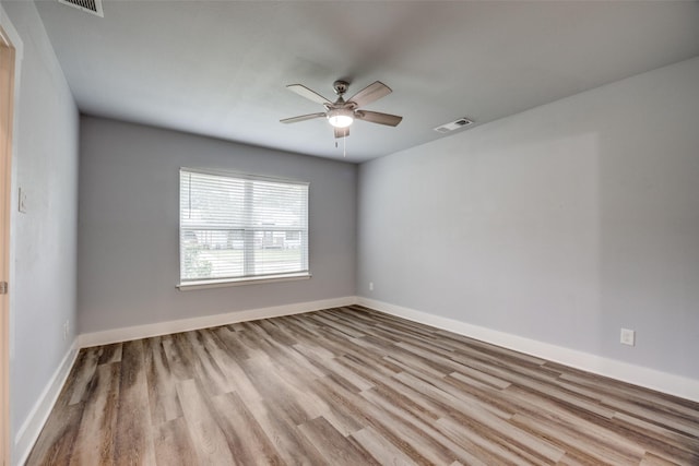 606 E 12th St, Bonham, TX 75418 - unfurnished room featuring a ceiling fan and wood finished floors