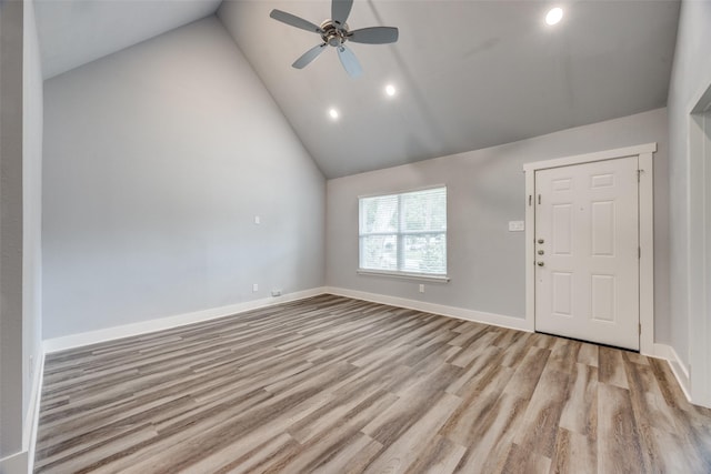 606 E 12th St, Bonham, TX 75418 - empty room with a ceiling fan, light wood-style flooring, recessed lighting, and high vaulted ceiling