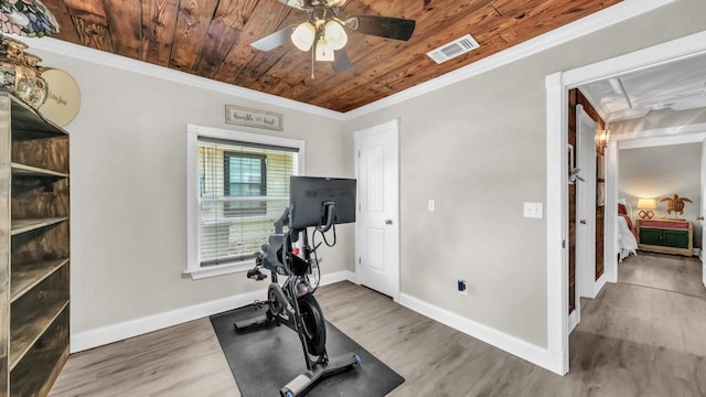307 Bryan St, Weatherford, TX 76086 - exercise room featuring ornamental molding, wood ceiling, ceiling fan, and wood finished floors