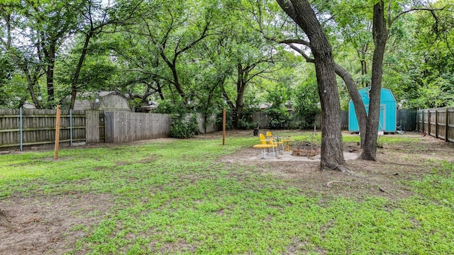 307 Bryan St, Weatherford, TX 76086 - fenced backyard featuring a shed