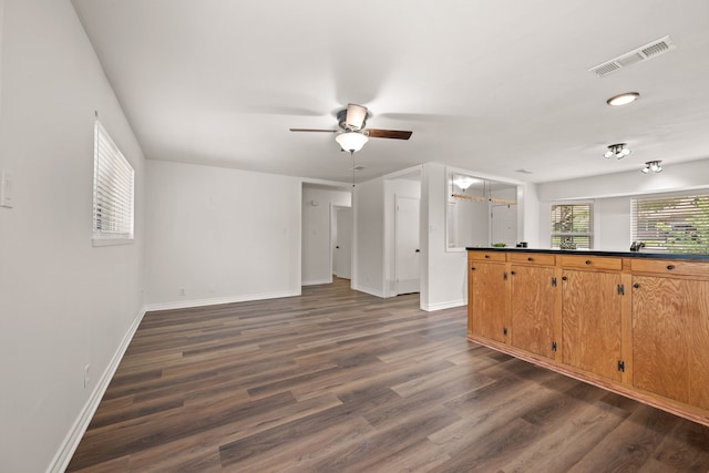 1814 Mary Dr, Euless, TX 76040 - unfurnished living room with dark wood finished floors and a ceiling fan