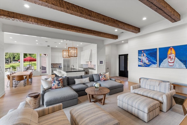 548 Winding Ln, Mount Vernon, TX 75457 - living area featuring recessed lighting, a chandelier, light wood-style floors, and beam ceiling