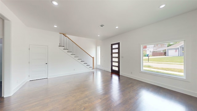 108 Frierson St, Waxahachie, TX 75165 - unfurnished living room featuring stairs, recessed lighting, and wood finished floors