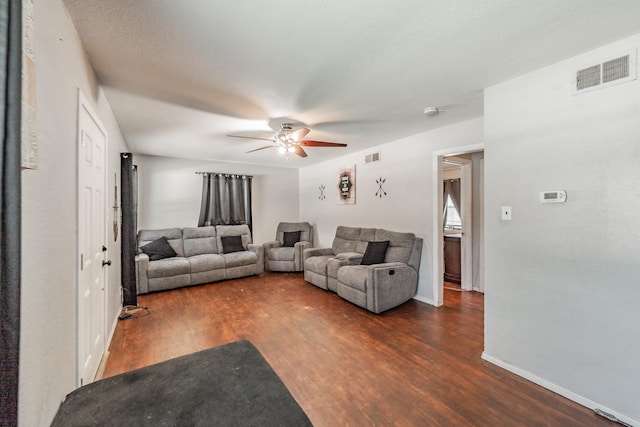 1106 Sunnyvale Dr, Arlington, TX 76010 - living area with a ceiling fan and dark wood-style floors