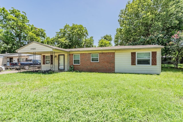 1106 Sunnyvale Dr, Arlington, TX 76010 - ranch-style house with a front yard and brick siding