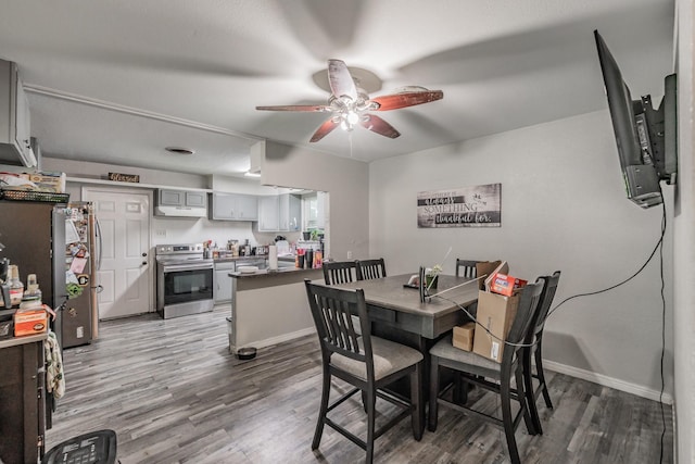 1106 Sunnyvale Dr, Arlington, TX 76010 - dining area with ceiling fan and wood finished floors