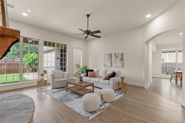 931 N Birdsong Dr, Allen, TX 75013 - living area with arched walkways, a ceiling fan, recessed lighting, and wood finished floors