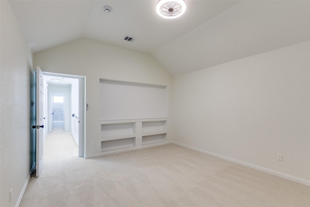3214 Blair Oak Dr, Rowlett, TX 75089 - additional living space featuring light carpet and vaulted ceiling
