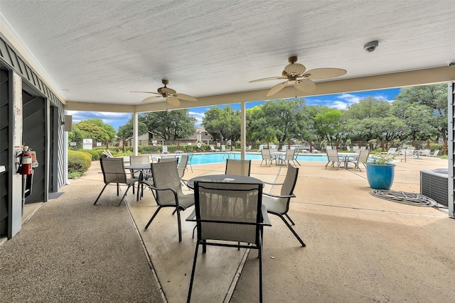 9424 Mountain Lk, Fort Worth, TX 76179 - view of patio / terrace featuring a ceiling fan and a community pool