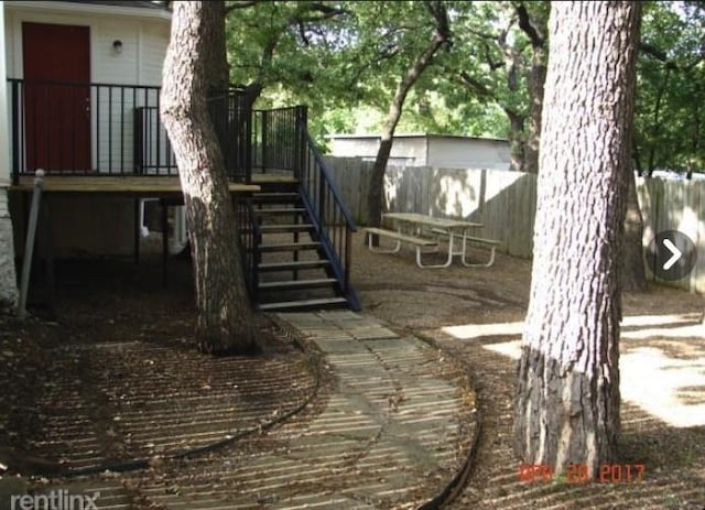 2207 N Elm St, Denton, TX 76201 - view of patio / terrace featuring stairway
