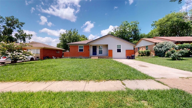 615 Royal Crest Dr, Mesquite, TX 75149 - ranch-style home featuring a front yard, brick siding, and driveway