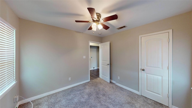 615 Royal Crest Dr, Mesquite, TX 75149 - unfurnished bedroom with carpet and ceiling fan