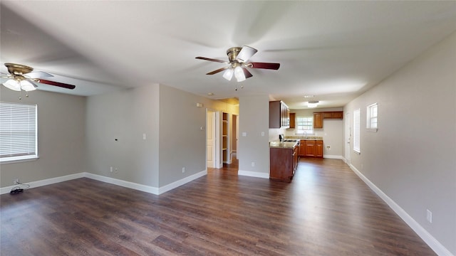 615 Royal Crest Dr, Mesquite, TX 75149 - unfurnished living room featuring ceiling fan and dark wood finished floors