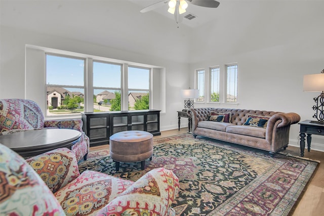 7432 Wispy Willow Ln, Little Elm, TX 76227 - living area featuring ceiling fan and wood finished floors