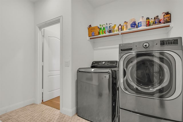 7432 Wispy Willow Ln, Little Elm, TX 76227 - washroom with washer and dryer and baseboards
