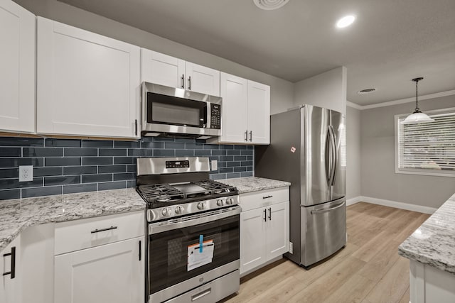 5120 Nadine Dr, Haltom City, TX 76117 - kitchen featuring stainless steel appliances, ornamental molding, white cabinets, light wood-style flooring, and tasteful backsplash