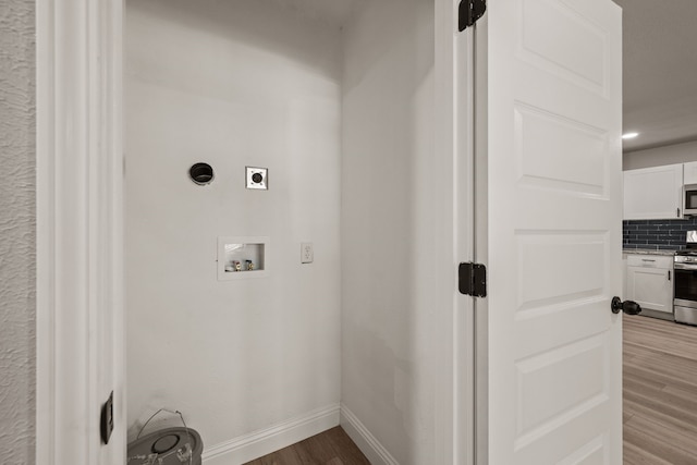 5120 Nadine Dr, Haltom City, TX 76117 - laundry room with electric dryer hookup, hookup for a washing machine, and wood finished floors