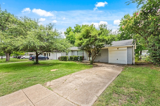5120 Nadine Dr, Haltom City, TX 76117 - view of front of house featuring brick siding, a garage, concrete driveway, and a front yard