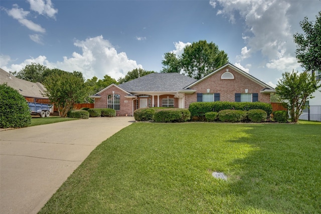 2308 Auburn Ct, Sherman, TX 75092 - single story home with brick siding and driveway