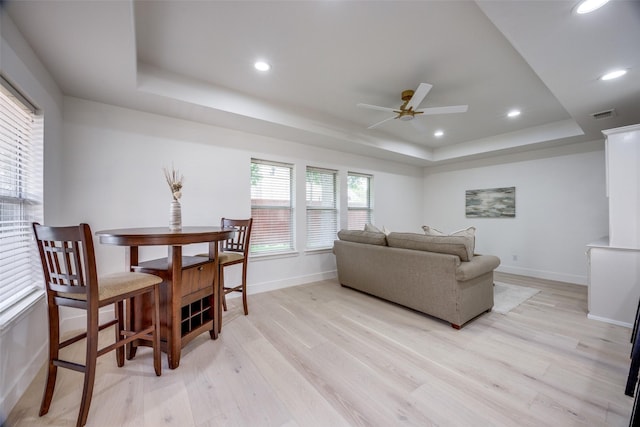 2308 Auburn Ct, Sherman, TX 75092 - living room featuring a raised ceiling, a ceiling fan, light wood-style floors, and recessed lighting
