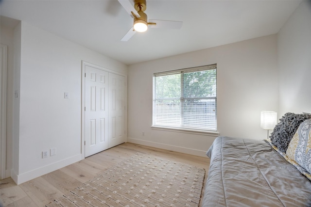 2308 Auburn Ct, Sherman, TX 75092 - unfurnished bedroom featuring wood finished floors, ceiling fan, and a closet