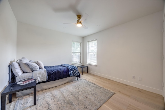 2308 Auburn Ct, Sherman, TX 75092 - bedroom featuring light wood-style flooring and a ceiling fan