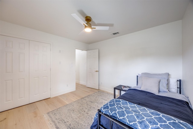 2308 Auburn Ct, Sherman, TX 75092 - bedroom with wood finished floors, a ceiling fan, and a closet