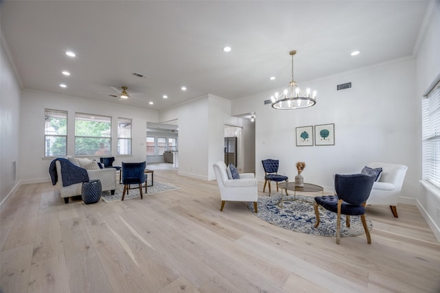 2308 Auburn Ct, Sherman, TX 75092 - living room with crown molding, light wood finished floors, recessed lighting, a chandelier, and ceiling fan