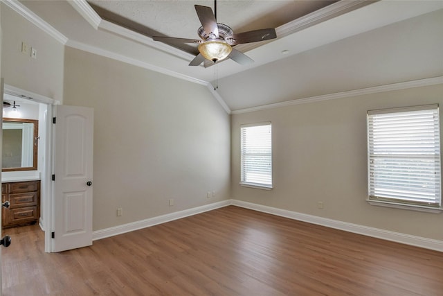 1306 Prestwick Ct, Granbury, TX 76048 - unfurnished bedroom featuring light wood-type flooring, ornamental molding, lofted ceiling, and connected bathroom