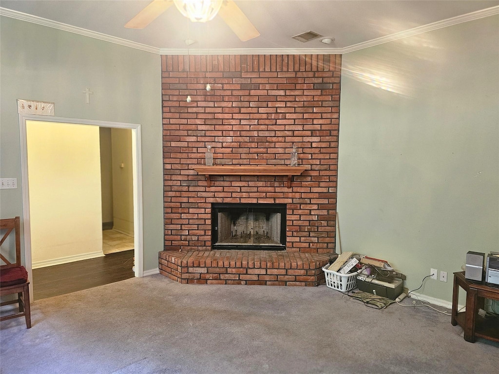 110 Woodcrest Dr, Haughton, LA 71037 - living area with carpet, ceiling fan, ornamental molding, and a brick fireplace