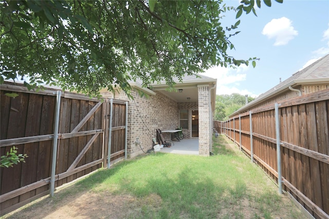 428 Gibbons Creek Trl, Mckinney, TX 75071 - fenced backyard featuring a patio and a gate