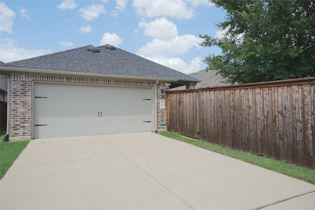 428 Gibbons Creek Trl, Mckinney, TX 75071 - view of home's exterior with a shingled roof, brick siding, concrete driveway, and a garage