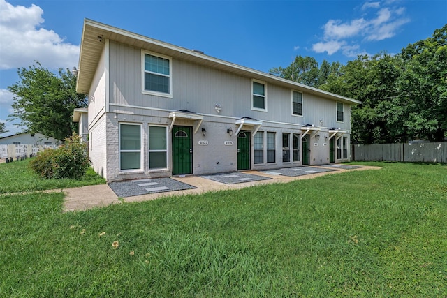 4927 Miller Ave, Fort Worth, TX 76119 - back of property with a patio area and brick siding