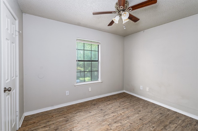 4927 Miller Ave, Fort Worth, TX 76119 - unfurnished room featuring wood finished floors, a textured ceiling, and a ceiling fan